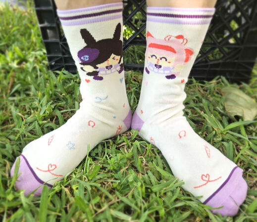 Socks I designed inspired by Haru Urara and Rice Shower. You can make them kiss each other!