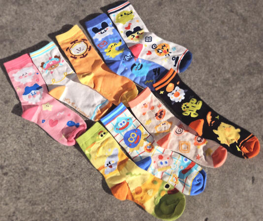 Other sock designs (Chopper, Bepo, Tamagotchi, Dragon Quest, Kirby, and Final Fantasy)