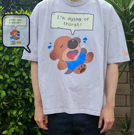 T-shirt inspired by Thirsty Dog from Dungeons of Aether! Model is wearing size 2XL.